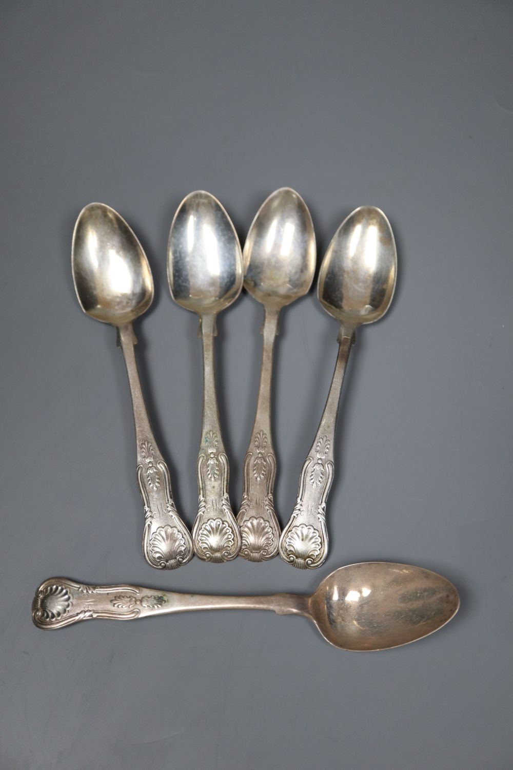 A set of five Victorian silver kings pattern teaspoons, monogrammed W, James McKay, Edinburgh, 1853/4, 3 oz (a.f.).